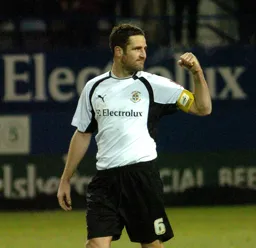 Chris Coyne celebrates