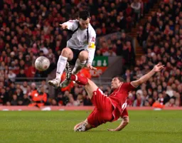 Matthew Spring jumps the oncoming tackle