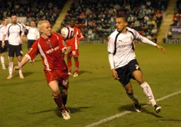 Dean Morgan looking to win the ball