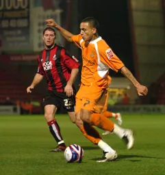 Dean Morgan with the ball