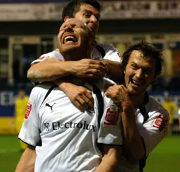 Sam Parkin celebrates with his teammates