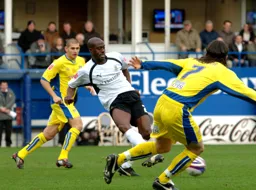 Paul Furlong slots a ball through