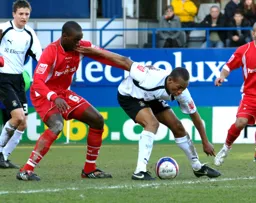 Calvin Andrew sheilds the ball