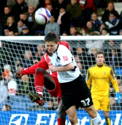 George Beavan heading away