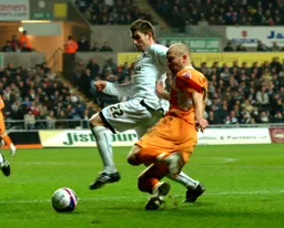 Sam Parkin trying to get a cross into the box