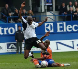 Paul Furlong gets kicked in the air