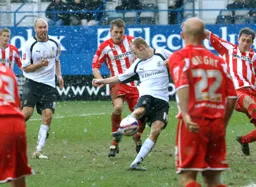 Drew Talbot takes a shot while Sam Parkin watches on