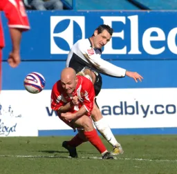 Matthew Spring crosses the ball