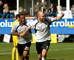 Calvin Andrew celebrates with goal scorer Sam Parkin