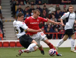 Stephen O'Leary challenges for the ball