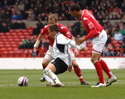 Darren Currie trying to get control of the ball