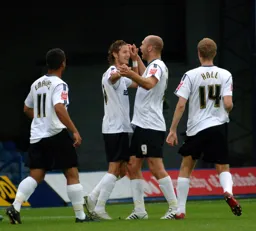 Rossi Jarvis is congratulated on his opening goal