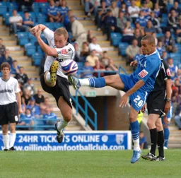 Kevin Watson clears the ball
