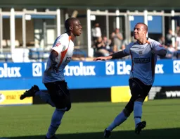 Claude Gnakpa is about to be congratulated by Keith Keane on his goal