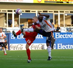 Wayne Andrews battles for the ball
