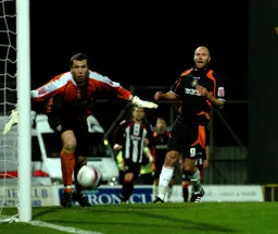Sam Parkin watches the ball go wide