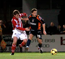 Paul McVeigh wins this midfield battle