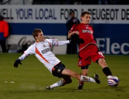 Rossi Jarvis goes in for a tackle