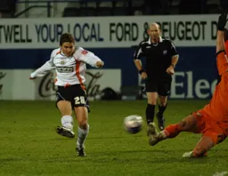 Paul McVeigh gets forward to try a shot