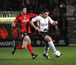 Kevin Gallen shields the ball