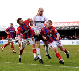 Sam Parkin is baulked by future Hatter Scott Griffiths