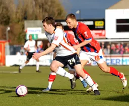 Tom Craddock races away with the ball