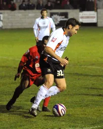 Kevin Gallen beats his man