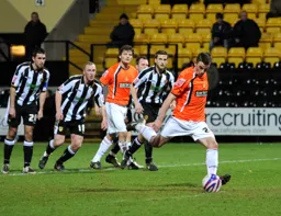 Tom Craddock converts from the spot for goal number two