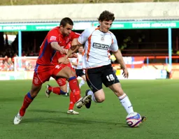 Chris Martin gets clear