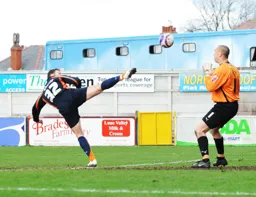 Kevin Gallen with an acrobatic touch for the Town's second goal