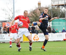 Asa Hall wins this midfield battle