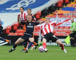 Keith Keane goes in for a tackle