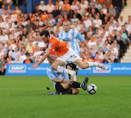 Fred Murray feels the full force of this tackle