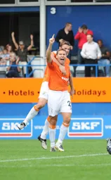 Kevin Gallen celebrates his goal with Tom Craddock