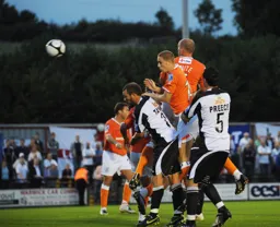 Asa Hall and Alan White get above the Forest Green defence