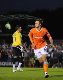 Tom Craddock turns away after scoring his goal