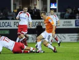 Jake Howells is tackled by Michael Brough