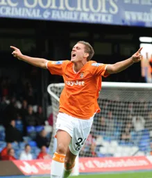 Ben Wright shows his delight after scoring Town`s second goal