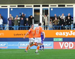 Andy Burgess goes to congratulate Steve Basham after scoring the third goal