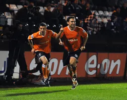Tom Craddock and Kevin Gallen celebrate the first goal