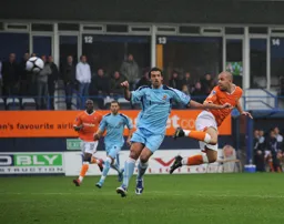 A flying header by Keith Keane. But his effort was saved