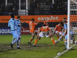 A scramble in the Cambridge goalmouth. But the ball stayed out