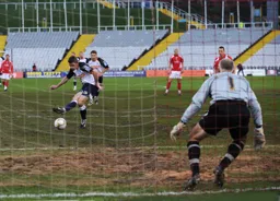 Tom Craddock scores Town`s first goal from the penalty spot