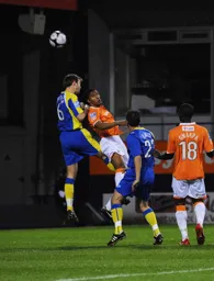 Shane Blackett tries to guide the ball goalwards