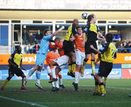 Janos Kovacs is outjumped in the Ebbsfleet goalmouth