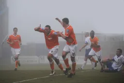 Liam Hatch wheels away after his header found the net