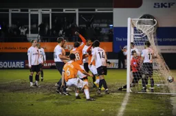 Keith Keane`s stoppage time corner goes straight into the net to give The Town a 2-1 win