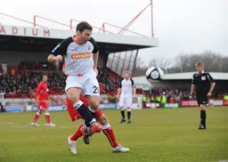 Kevin Gallen looks to hold the ball up