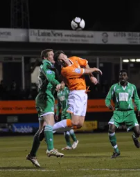 Kevin Gallen keeps his eyes shut as he challenges for the ball
