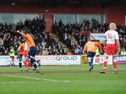 Matthew Barnes-Homer wheels away after scoring his goal